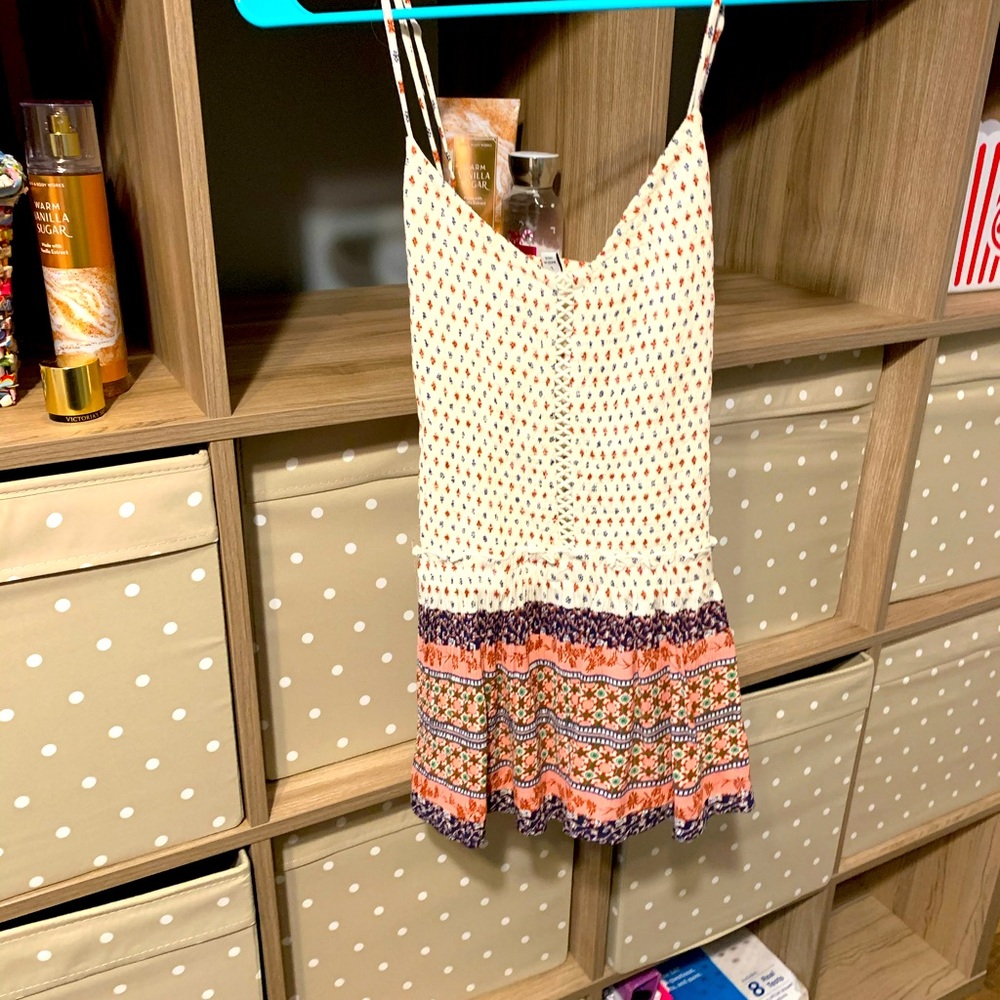 Cute cross back summer tank. Works well with denin